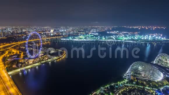 新加坡天际线与著名的新加坡摩天轮夜机视频的预览图