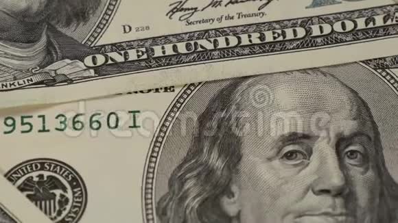 一百美元钞票本杰明富兰克林特写镜头2钞票的宏观摄影运动摄影机视频的预览图