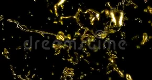 抽象的金色金属水溅豪华黄金效果与滴在黑色背景阿尔法通道豪华概念视频的预览图