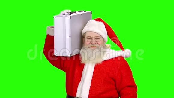 圣诞老人拿着公文包绿色屏幕视频的预览图