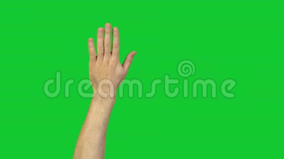 男性左手拇指在绿色背景上视频的预览图