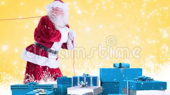 带蓝色礼物和降雪的圣诞老人条款视频的预览图