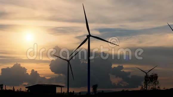 风力涡轮机剪影日落景观清洁能源视频的预览图