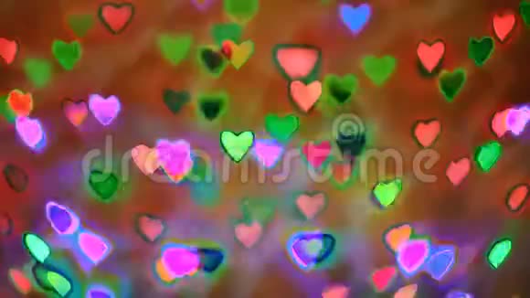 闪烁五颜六色的花环形状像心形用作情人节的背景霓虹灯效果视频的预览图