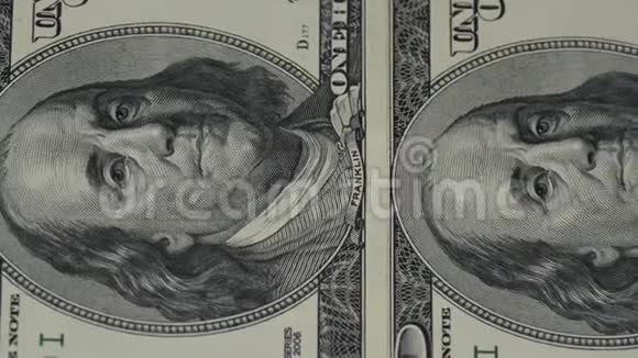 一百美元的钞票运动相机滑块钞票的宏观摄影本杰明富兰克林特写肖像视频的预览图