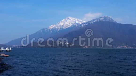 卢加诺湖和雪山景观视频的预览图