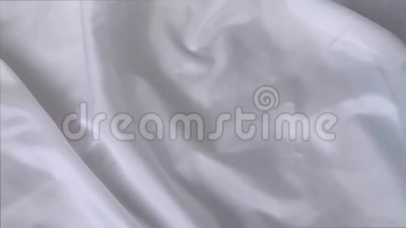 美丽的白色丝绸织物披着小褶皱轻柔流动奢华婚礼的概念质地背景形式视频的预览图
