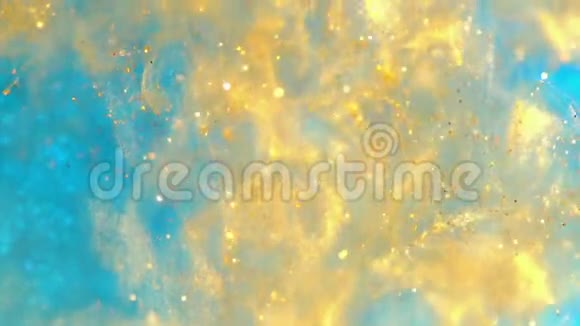 水中的金墨水闪烁的油漆反应产生抽象的云层形成闪亮的火花可用作视频的预览图