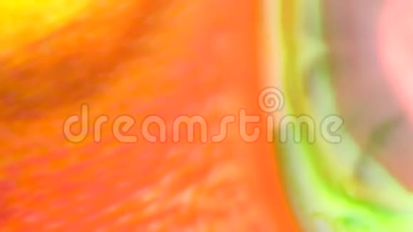 橙色黄色红色抽象的食物颜色墨水移动或流动的背景视频的预览图