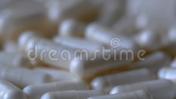 旋转胶囊的特写药房背景视频的预览图