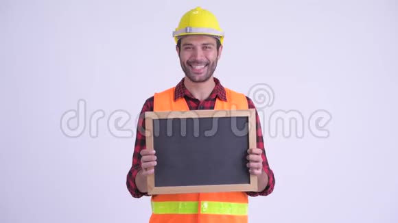 快乐胡子的波斯建筑工人拿着黑板视频的预览图