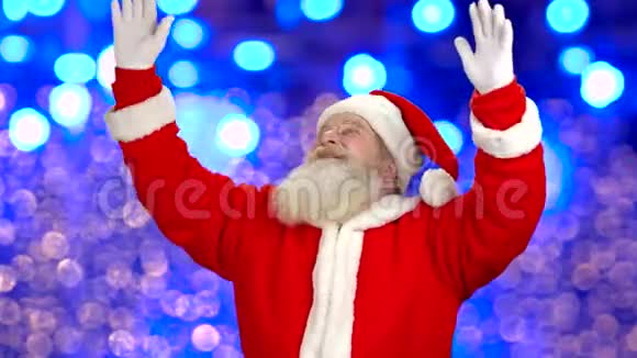 圣诞老人做手势灯光背景视频的预览图