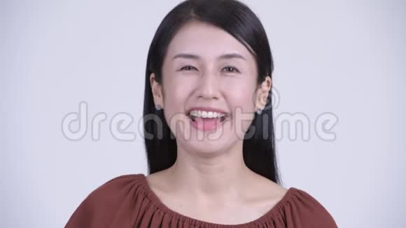 快乐美丽的亚洲女人的笑脸视频的预览图