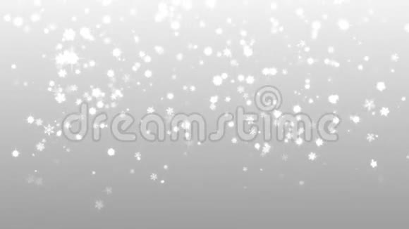 圣诞节的银色背景雪花飘落的雪花圣诞与星星视频的预览图