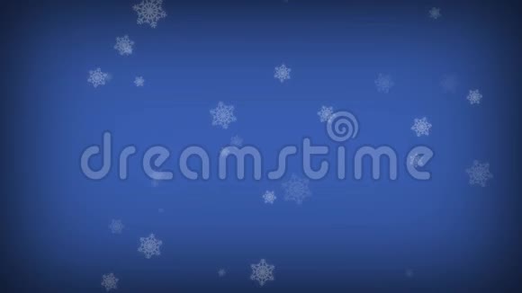 落在蓝屏上的大雪花冬季降雪圣诞快乐新年快乐视频的预览图