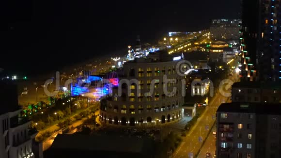 巴统阿贾拉佐治亚州现代建筑在夜晚或夜晚的海滨长廊中照明灯光视频的预览图