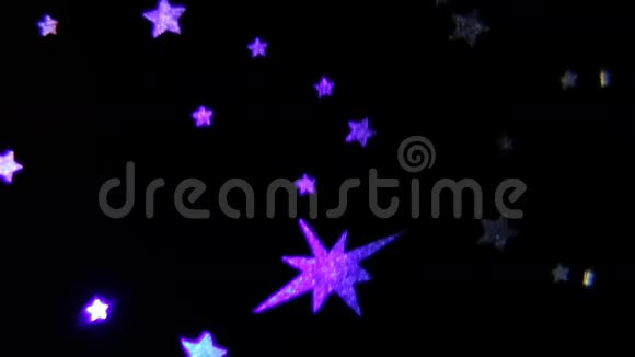 五颜六色的小星星在黑色上视频的预览图