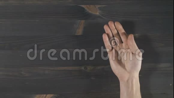 家庭手木制背景俯视视频的预览图