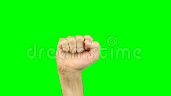 上升的拳头标志手势手在绿色屏幕上视频的预览图