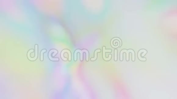 快速和缓慢的抽象模糊电影彩虹全息多色背景视频的预览图