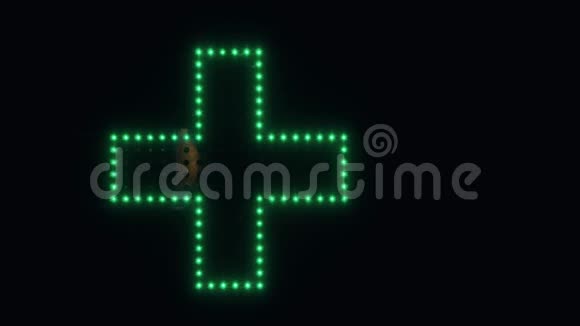 照明绿色和红十字会药房街标志视频的预览图