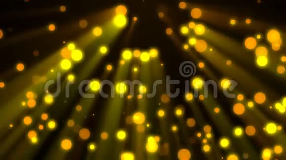 可循环背景在光束中飞行的金色粒子视频的预览图