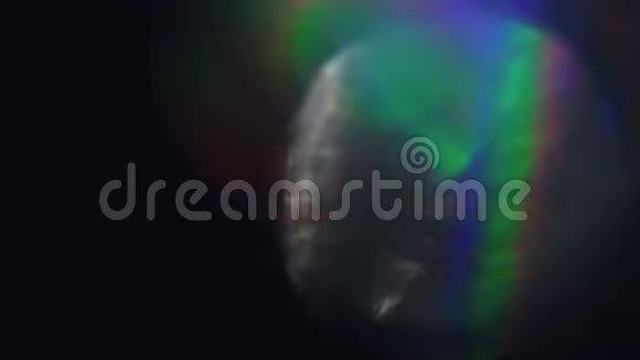 迷幻的背景彩虹箔闪烁的五颜六色的bokeh视频的预览图