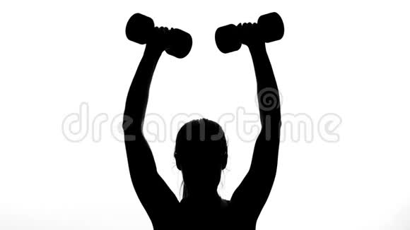 在一个白色的背景上一个阴影一个女性人物的黑色轮廓为手部肌肉做运动使用视频的预览图