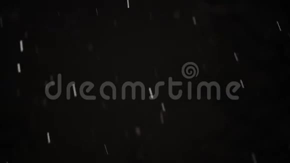 雪落在黑暗的背景下视频的预览图