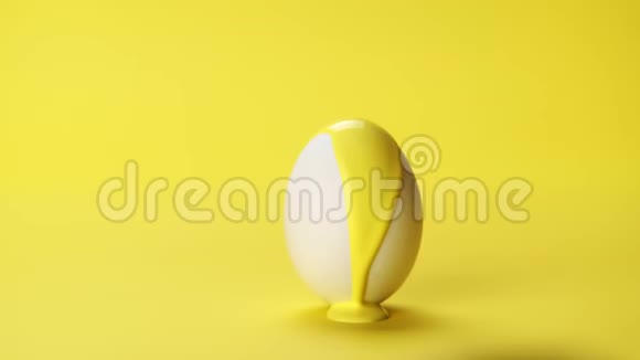 白色鸡蛋上的黄色和茶色油漆视频的预览图