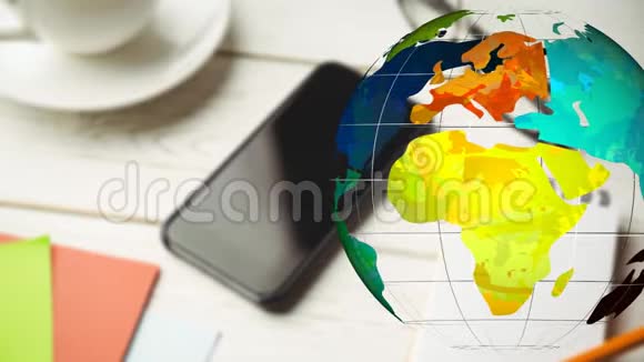 彩色地球仪在手机前旋转的动画视频的预览图
