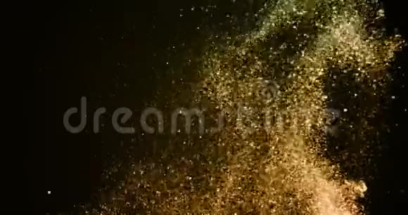 圣诞节金色渐变闪光爆炸尘埃粒子背景波克在缓慢下降视频的预览图