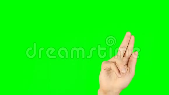 滑动旋转捏缩放手指手势前视图手在绿色屏幕上视频的预览图