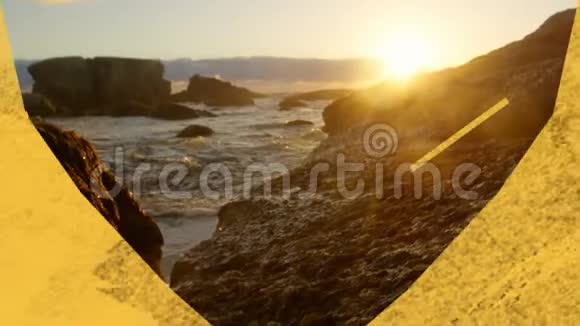 海岸线和岩石通过黄色心形前景视频的预览图