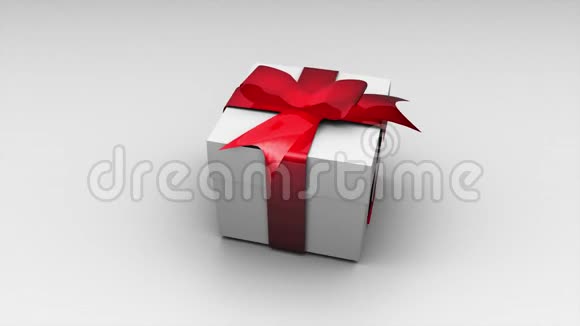 旋转礼物盒与红色丝带孤立的3D视频渲染假日礼品盒与阿尔法频道隔离视频的预览图