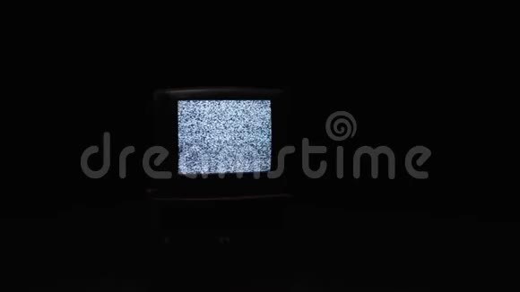 黑暗中旧电视屏幕上的静态噪音库存黑色背景干扰的电器视频的预览图