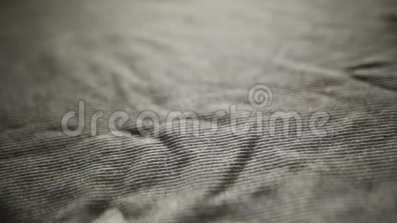 面料质地纺织背景纺织品特写灰色亚麻织物质地大即使是光滑的织物背景视频的预览图