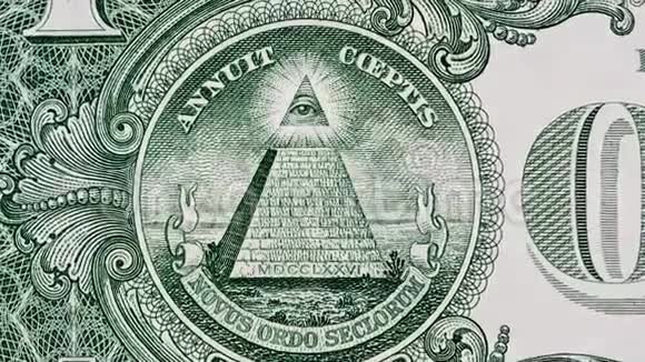 创意4k视频的细节1美元钞票宏观特写与金字塔和效果发光梅森眼视频的预览图