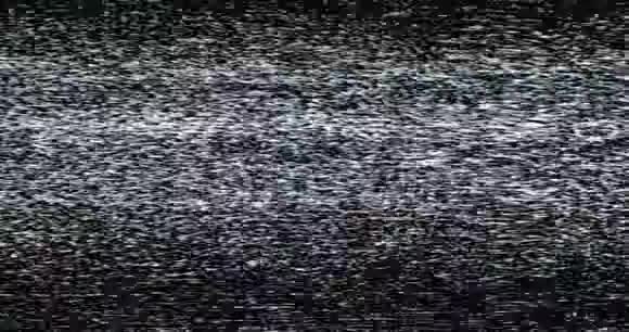 灰色黑白vhs故障噪声背景真实闪烁静态噪声背景视频的预览图