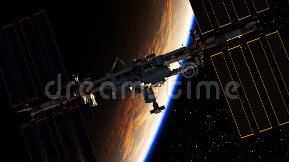 地球和太阳升起背景下国际空间站的飞行视频的预览图