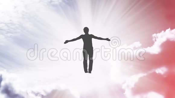 张开双臂的人的轮廓在明亮的白光中飞翔在其中溶解开放思想的概念视频的预览图