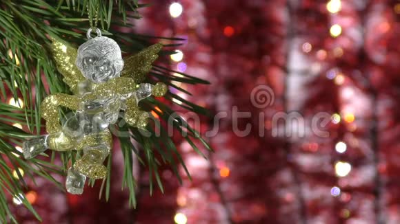 花环背景上的圣诞天使模糊的灯光博克背景视频的预览图