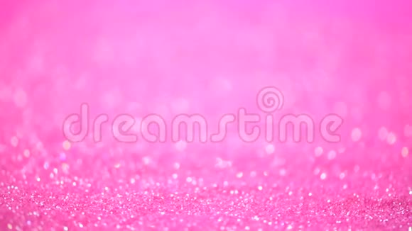 喜庆的粉红色背景抽象的闪亮灯光闪亮的假日背景视频的预览图