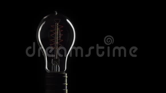 真正的爱迪生灯泡闪烁老式灯丝爱迪生灯泡快关门4KUHD视频思想的象征光视频的预览图