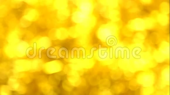 抽象的散焦闪烁模糊的金色波基圣诞节新年装饰和庆祝假期视频的预览图