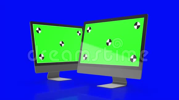 两台绿色屏幕的现代电脑隔离在蓝色背景上三维渲染视频的预览图