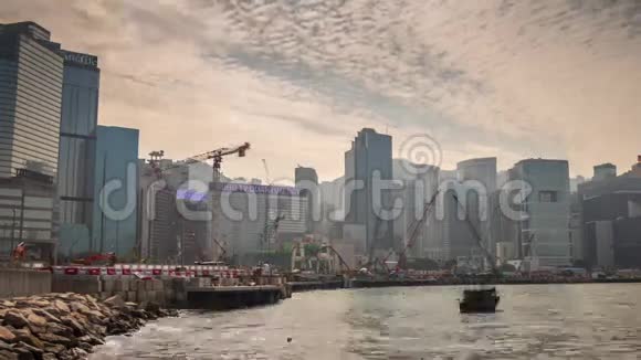 日落香港景海湾建设全景4k时间流逝中国视频的预览图