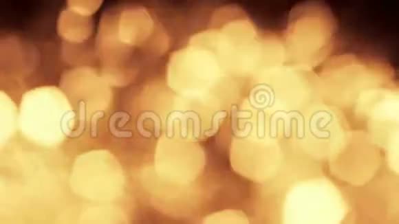 闪闪发光的金色火焰抽象的背景视频的预览图