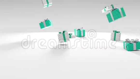 蓝绿白相间的圣诞礼物盒上面裹着蓝白色丝带落在地上视频的预览图