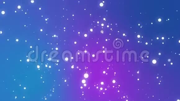 白色的雪花在紫色的蓝色背景下飘落下来视频的预览图